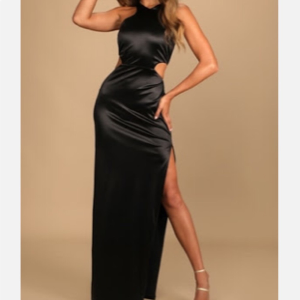 On trend, high neck black cutout dress from Lulus.